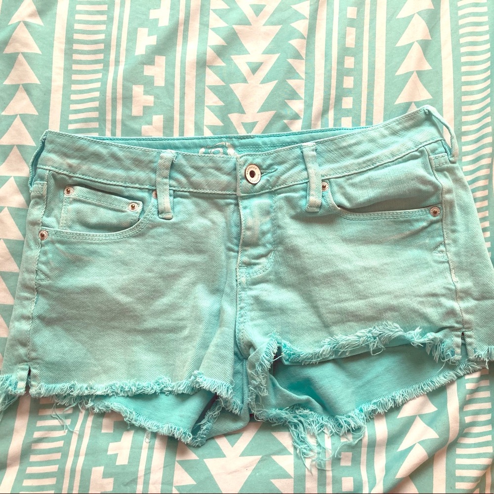 Teal cut off shorts